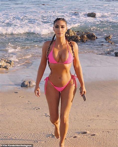 Kim Kardashian Works Her Gym Honed Body In Hot Pink Bikini Daily Mail