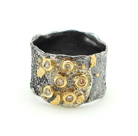 Oxidized Sterling Silver With 18k Yellow Gold And Diamonds Oxidized