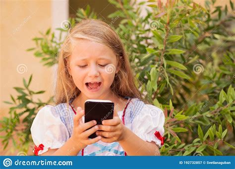 Crying Girl Using Smartphone Outside Stock Image Image Of Dress