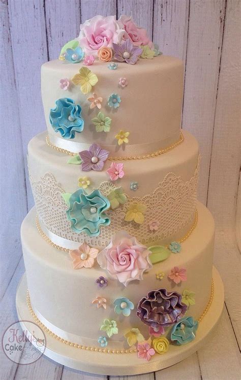 Pastel Rainbow Flower Cascade Wedding Cake Cake By