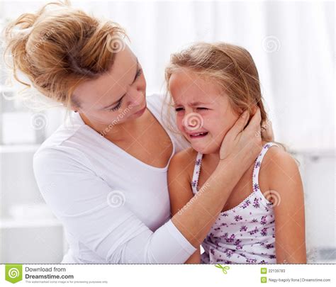 Mother Comforting Her Crying Little Girl Stock Photos