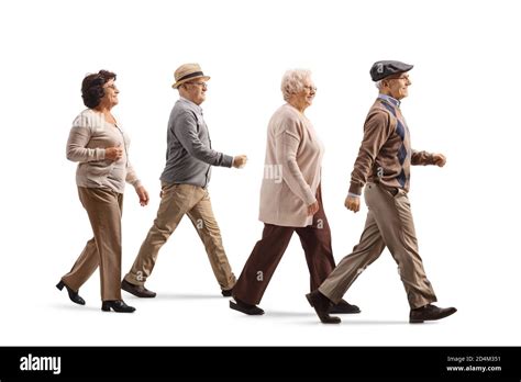 Group Of Elderly People Walking Isolated On White Background Stock