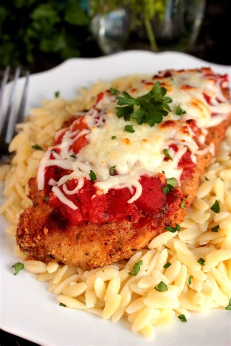 To save fat and calories, i've been baking my chicken parmesan for years, using a more traditional topping of marinara sauce and mozzarella. Easy Weeknight Baked Chicken Parmesan - Big Bear's Wife