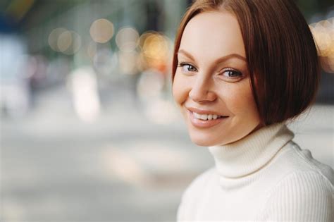 Premium Photo Sideways Shot Of Pleasant Looking Woman With Make Up