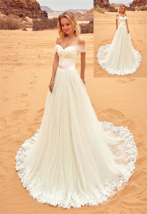 Pair your simple gown with an intricate veil, blingy belt or effortless. Beach Wedding Dresses,Long Lace Wedding Dresses,Handmade ...