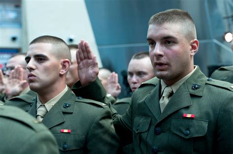 Newly Commissioned Marine Corps 2nd Lieutenants Raise Their Hands To