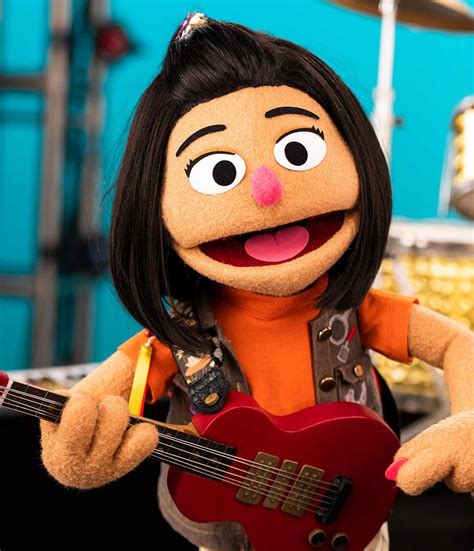 Sesame Street Debuts First Asian American Muppet Ji Young