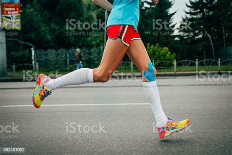 Girl Athlete Running A Marathon Stock Photo Download Image Now