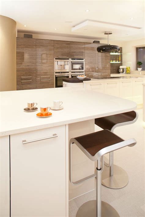 Flirt with grey picking a shade that borders on deep grey is another way to use green in a modern space, as grey has such contemporary connotations. Gallery | idesigninteriors | Ivory kitchen, Kitchen, Interior