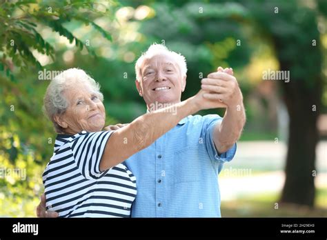 Cute Elderly Couple Dancing Outdoors Time Together Stock Photo Alamy