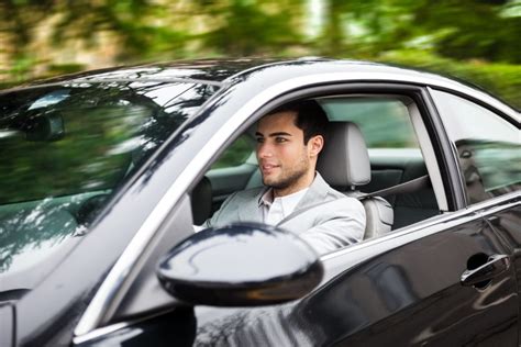 17421622 Portrait Of A Man Driving A Car Global Mobility Legal Blog