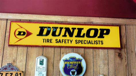 1960s Dunlop Tires Single Sided Embossed Tin Sign Z225 Las Vegas 2021