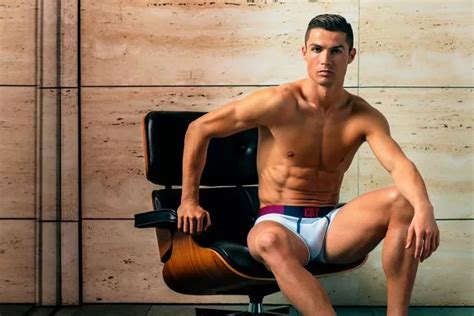 Cristiano Ronaldo Looks Excited To Be Modelling As He Strips To His