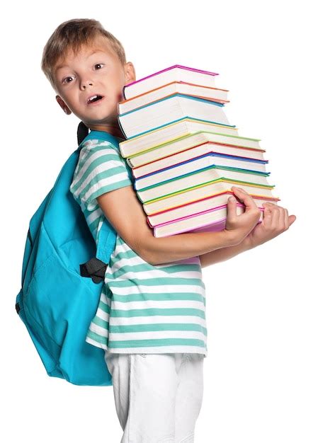 Premium Photo Happy Little Boy With Books Isolated On White Background
