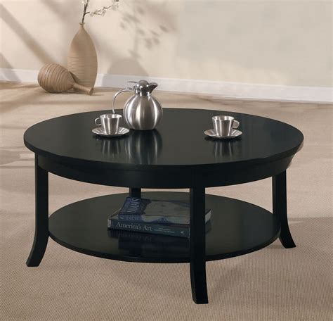 The square tabletop provides lots of room for your favorite puzzles. Gardena Black Round Coffee Table with Shelf