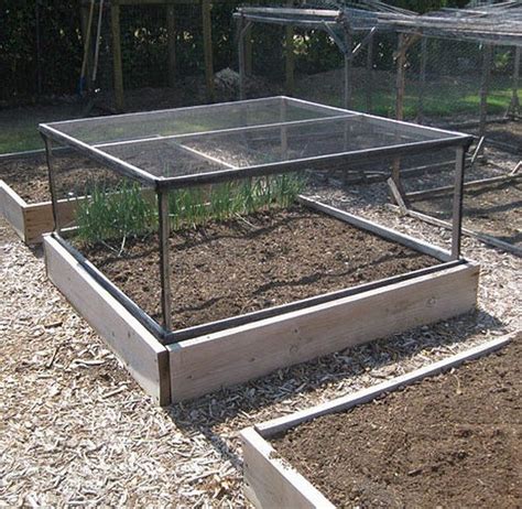 Building a raised garden box to grow food for your family is a fun project and a healthy way to provide produce. How to Make a Removable Raised Garden Bed Fence | The garden!