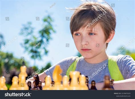 Serious Boy Playing Chess Outside Summer Stock Photo 2170675525