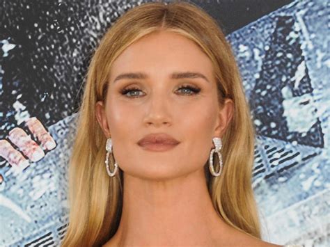 Rosie Huntington Whiteleys Heavenly Swimsuit Photos Include A Rare Appearance From Her Daughter