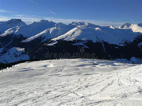 Ski Slopes And Snow Capped Mountains In Davos Switzerland Stock Photo