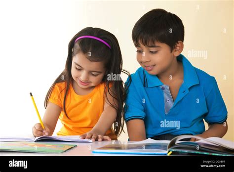 Indian Children Studying Hi Res Stock Photography And Images Alamy
