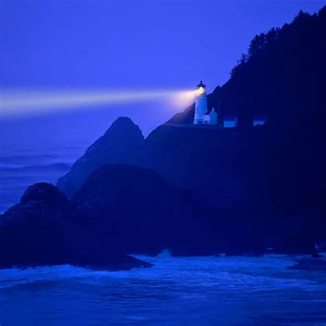 Lighthouse Beams Across Stormy Night Sea Heceta Head Oregon Coast