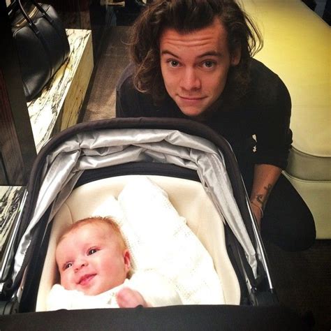He Loves Babies Harry Styles Photos Harry Styles Pictures Harry