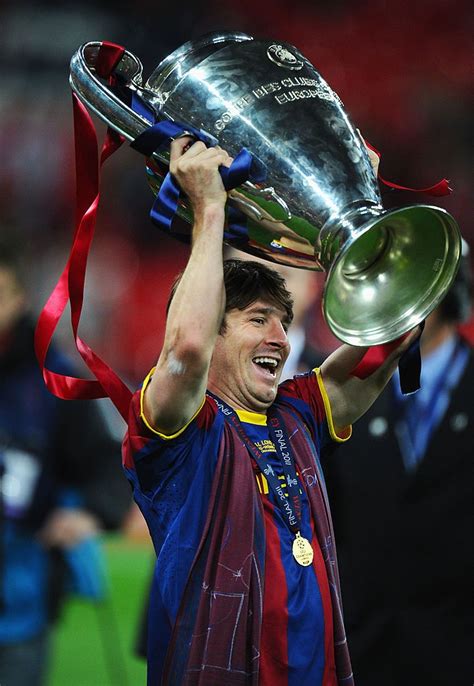 London England May 28 Lionel Messi Of Fc Barcelona Lifts The Trophy