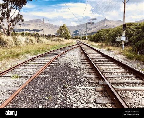 Tram Tracks Converging Towards The Horizon Stock Photo Alamy