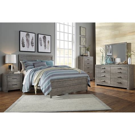 A silver paint finish and classic details set the right tone, while thoughtful design touches and storage pieces that are both beautiful and functional. Ashley Furniture Signature Design Culverbach B070 Q ...