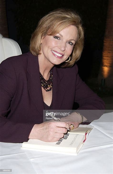 Actress And Former Cbs Sportscaster Phyllis George Signs Copies Of