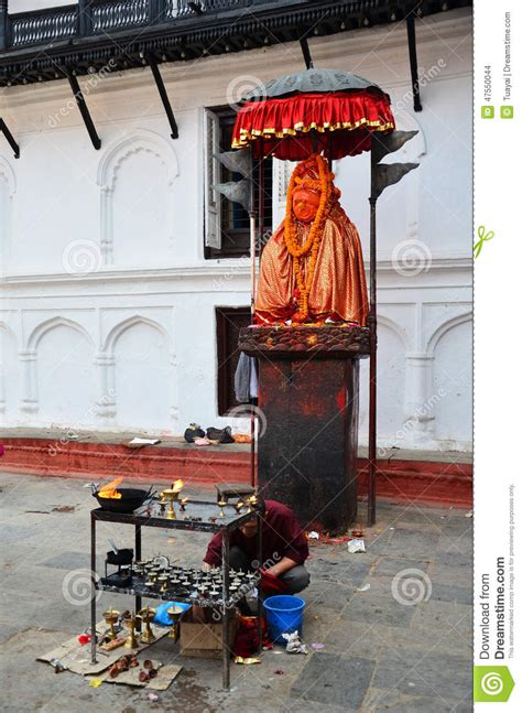 nepalese people pray with hanuman statue at basantapur durbar square editorial stock image
