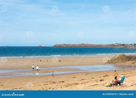 Romantic Walk Of People On The Picturesque Beach Of Saint Malo