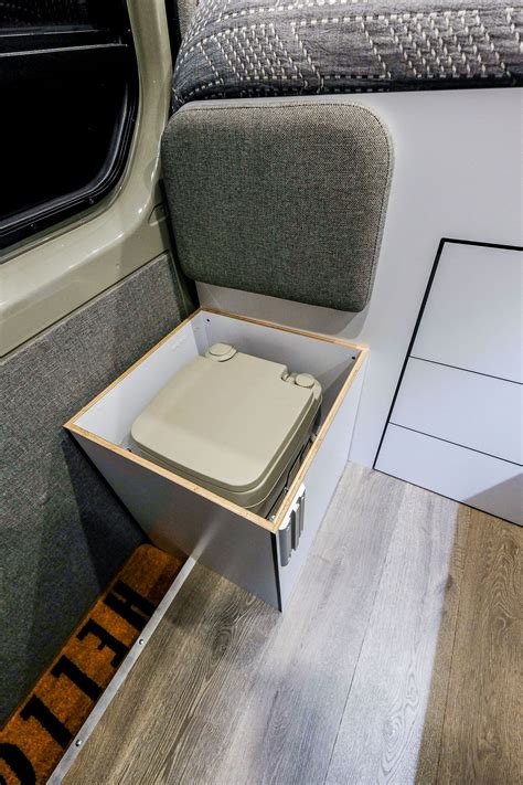 The Jump Seat Has A Hidden Cassette Toilet Tucked Neatly Inside