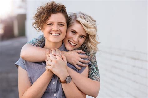 Laughing Lesbian Couple Having Fun Together At The Beach Stock Image Image Of Caring Love