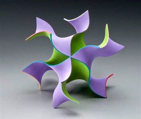 An Abstract Sculpture Made Out Of Colored Paper