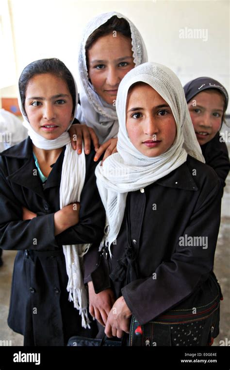 A Group Of Afghan School Girls Wearing Hijab In A Classroom Of A
