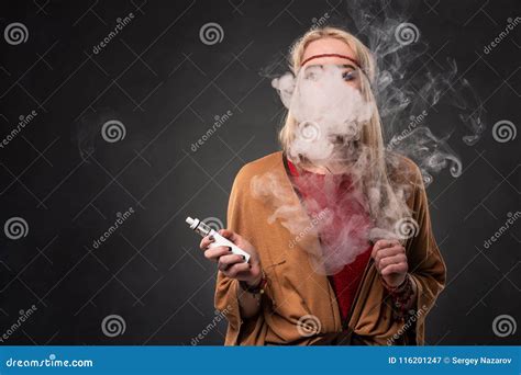 Portrait Of Young Hipster Smoking Vaping Girl The Woman Is Dressed In