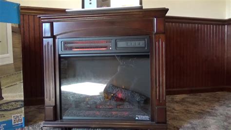 The freestanding fireplace uses infrared quartz to emit heat without drying out the air and will automatically shut off if it gets too hot. Chimney free electric fireplace space heater review - YouTube