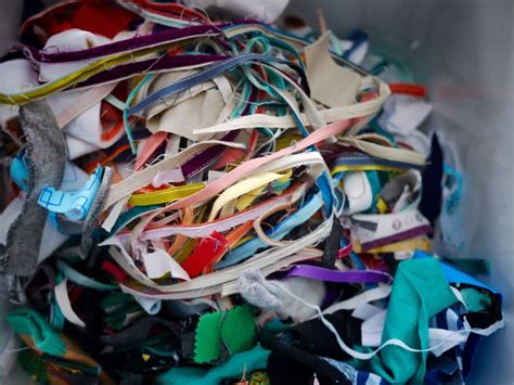 A Bin Filled With Lots Of Different Colored Ribbons