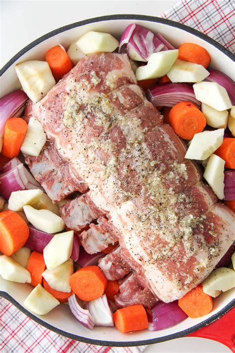 Slow roast the pork in the preheated oven until the pork is no longer pink near the bone, about 5 hours. One Pot Oven Roasted Bone In Pork Rib Roast with ...