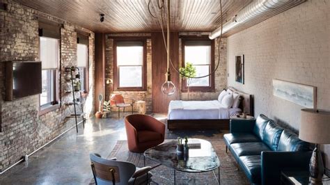 Shabby Chic Hotel With Exposed Brick Walls And Industrial Lighting
