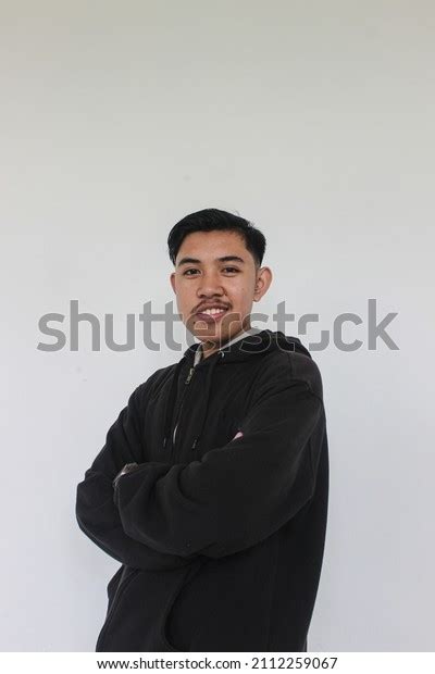 Young Man Wearing Black Hoodie Posing Stock Photo 2112259067 Shutterstock
