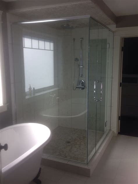 What is the purpose of floor mounted hinges? Full view corner shower enclosure Glass mounted door ...