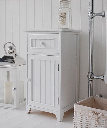 They're shaped to perfectly fit into tight corners. A crisp white freestanding bathroom storage furniture. A ...