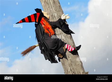 Halloween Witch On Broomstick Crashing Into Hydro Utility Stock Photo