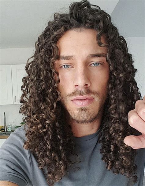 9 Jaw Dropping Curly Hairstyles For Men NaturallyCurly Com