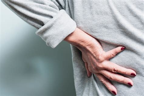 Back Pain and Nausea: Causes, Diagnosis, and Treatments