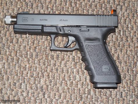 Glock Model 21 Sf Pistol In 45 Acp With Threaded Barrel And Snake Eyes