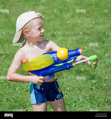 Squirts Water Gun Hi Res Stock Photography And Images Alamy