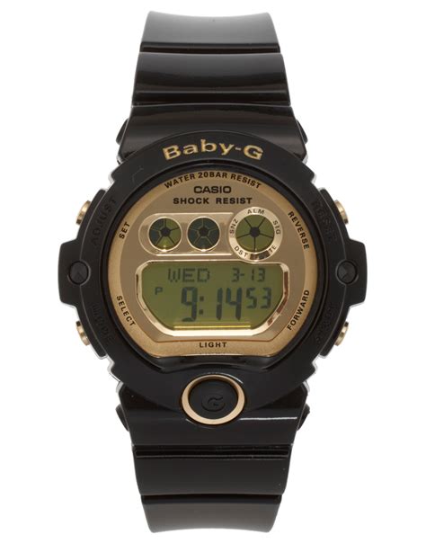 (points for at least having the light be amber to match the gold accents. G-shock G Shock Baby G Black Digital Watch in Black | Lyst